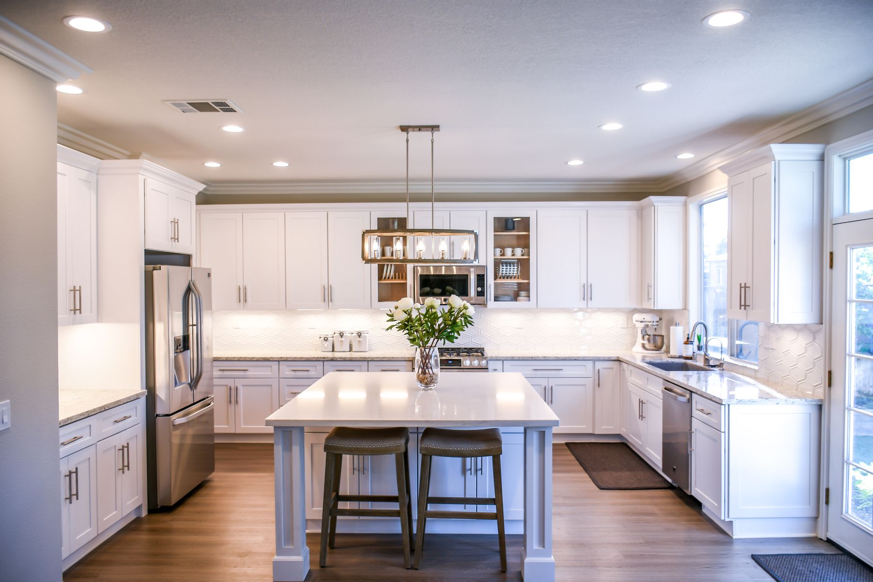A remodeled kitchen with an island